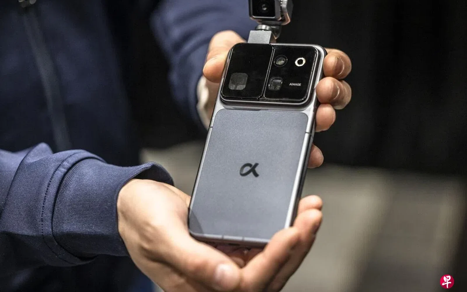 HONOR concept phone with an external camera module held in two hands